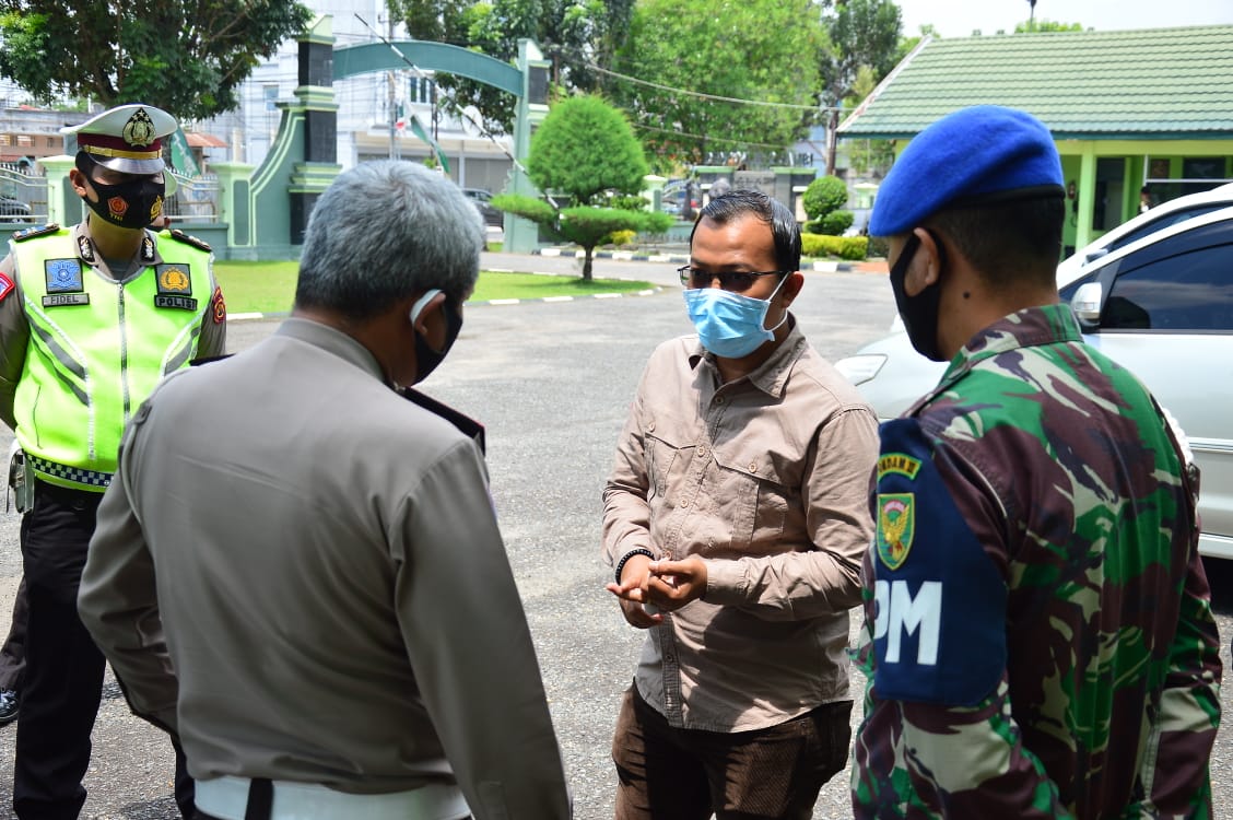 Bawaslu Bersama Ditlantas Polda dan Denpom II/2 Jambi Lakukan Sosialisasi Covid-19